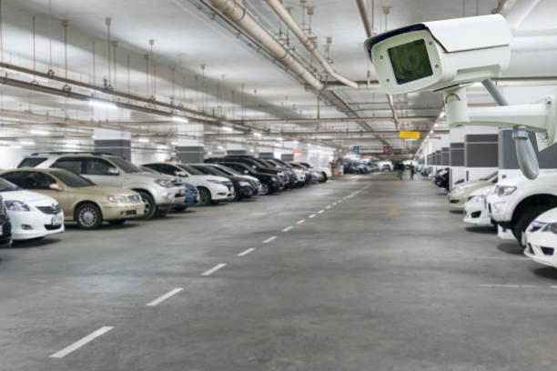 istock CCTV camera security in Parking garage In the mall for background. 945713818