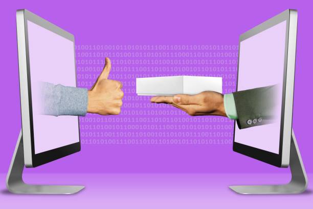 istock information concept, two hands appear from laptops. thumbs up, like on the letf and hand with white tablet computer box on the right. illustration 945715954