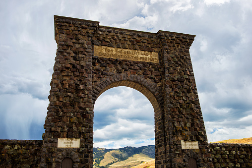 The Roosevelt Arch is a triumphal arch at the north entrance of Yellowstone National Park near Gardiner. It was completed 1903.