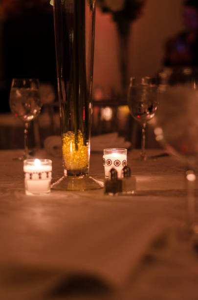 istock candles on top of dinner table 945724472