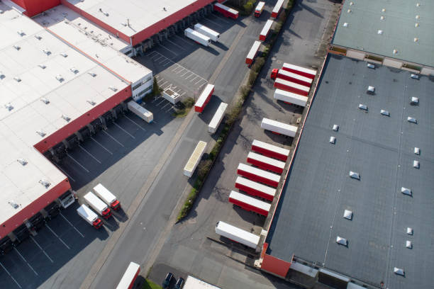 istock Distribution logistics buildings and industrial area - aerial view 945729642