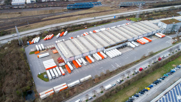istock Distribution logistics buildings and industrial area - aerial view 945729708