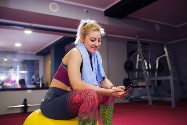istock Girl is having break after pilates 945733368