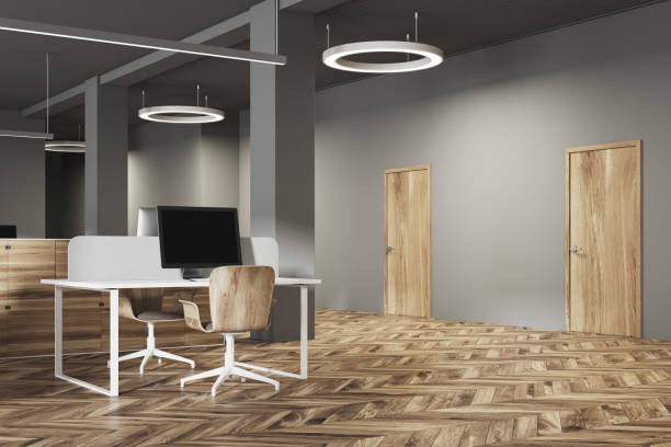 istock Dark and wooden office interior side close up 945748546