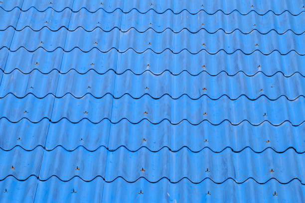 istock Blue roof tiles or shingles on house as background image 945757446