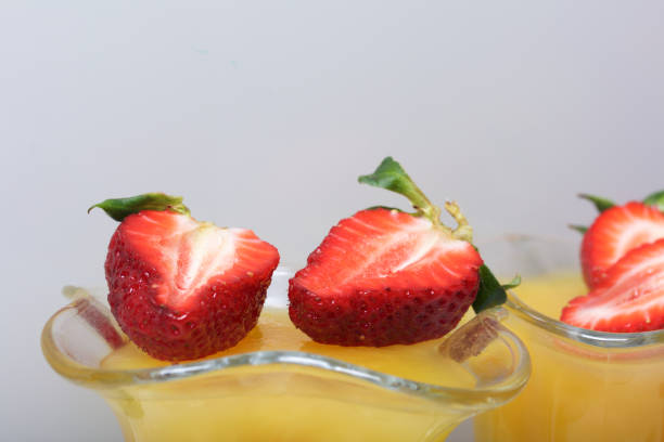 istock Jelly in the crockery, decorated with strawberries. 945774384