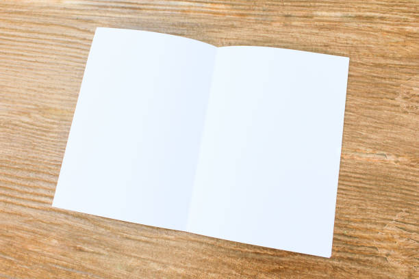 istock The white paper on the wooden table. 945782864
