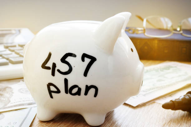 istock Retirement plan. 457 plan written on a  piggy bank. 945783064