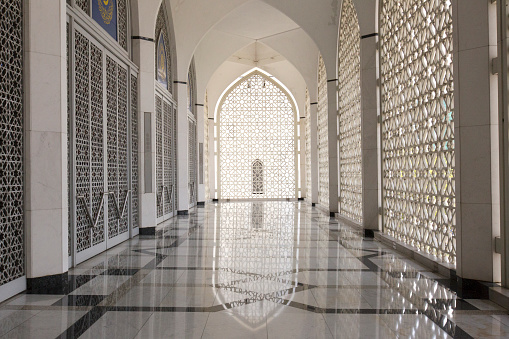 Shining floor marble reflection at the Sultan Salahuddin Abdul Aziz Mosque corridor in Malaysia.
The Sultan Salahuddin Abdul Aziz Shah Mosque is the state mosque of Selangor, Malaysia. It is located in Shah Alam. It is the country's largest mosque and also the second largest mosque in Southeast Asia after Istiqlal Mosque in Jakarta, Indonesia.