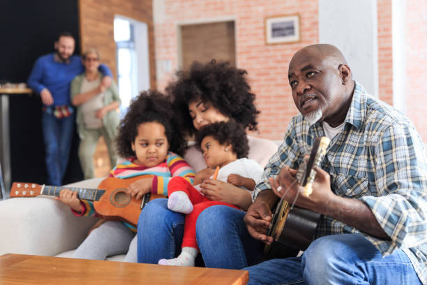 istock Grandpa plays guitar 945819590