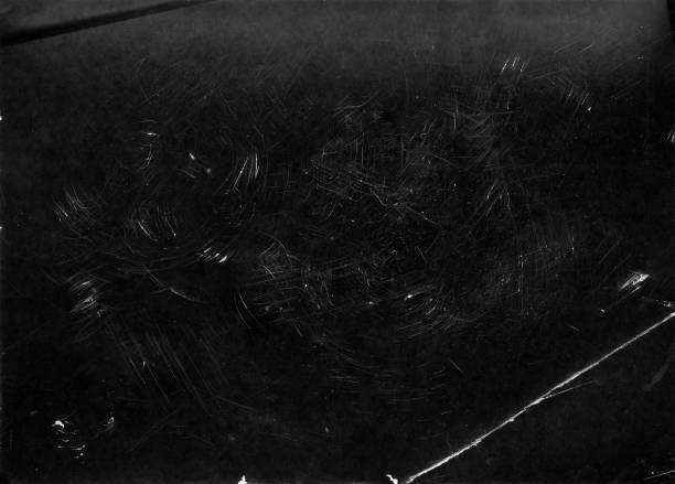 istock Rough scratches on old photographic paper - useful like a layer for photo editor 945820168