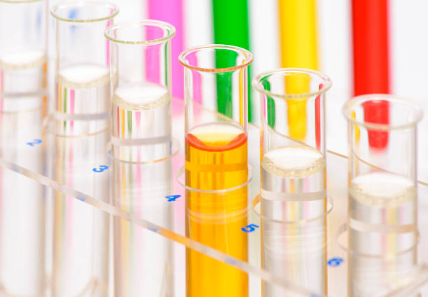 istock scientific experiment in chemistry laboratory with liquid in test tubes 945824586