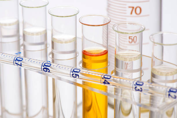 istock scientific experiment in chemistry laboratory with liquid in test tubes 945824602