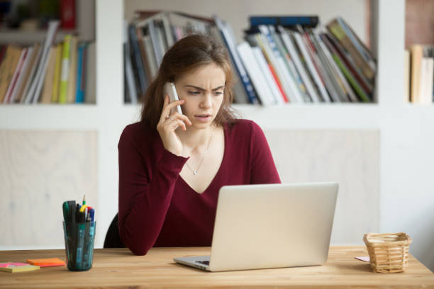 istock Concerned businesswoman solving company problems over phone 945838048