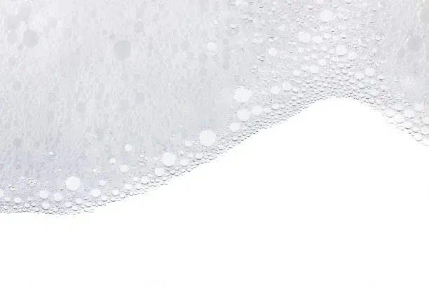 Foam bubbles abstract white background. Detergent