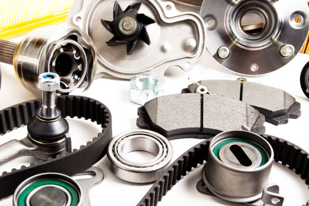 istock Auto parts background. Hub, pump, brake pads, filter, timing belt, rollers, constant velocity joints, thermostat and other on white background 945852248