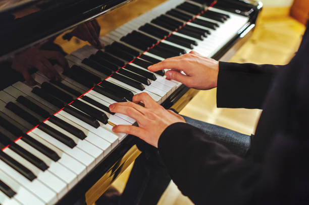 istock The groom plays the piano 945852580