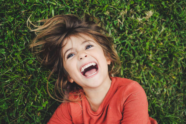istock Girl in the Grass 945861384
