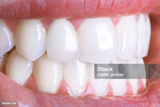 Closeup Of A Shiny White Human Teeth Stock Photo - Download Image Now - Teeth, Tooth Whitening, Close-up