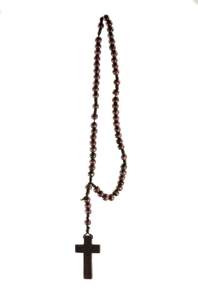 istock Wood rosary on a white background 945875170