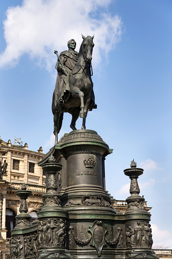 King Johann horse rider statue, John of Saxony Monument in front of opera house Semperoper concert hall in Dresden, Germany