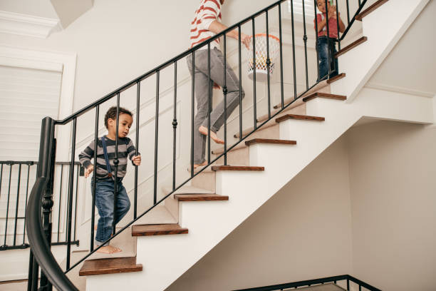 istock Family climbing up the stairs. 945885652