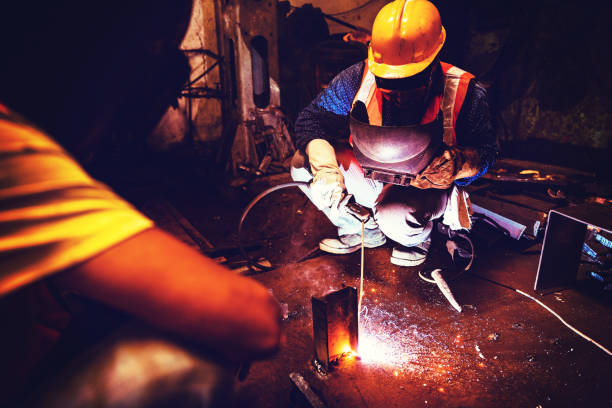 istock Steel Industry Workers hard at work with their gear. 945892606