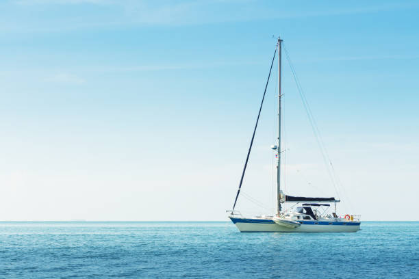 istock Yacht in the sea against blue sky 945892930