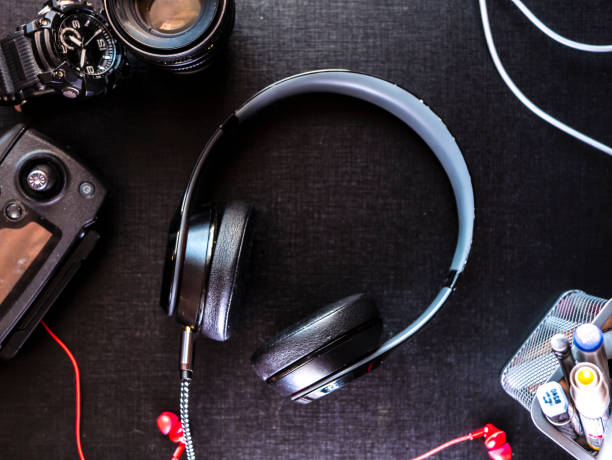 istock top down view of travel gadgets and accessories on the table with black surface 945905002