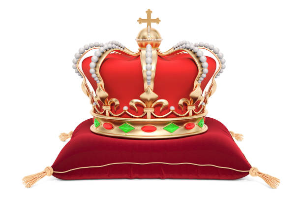 istock Royal Crown on the red velvet pillow, 3D rendering isolated on white background 945905532