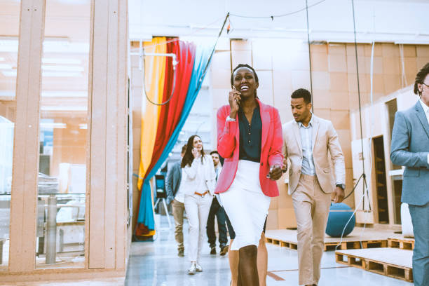 istock Business people walking modern offices 945910370