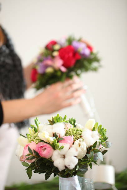 istock master class florist teaches the making of a bouquet 945925444