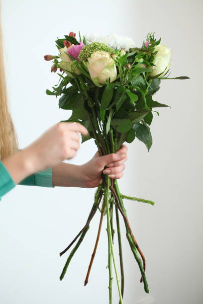 istock master class florist teaches the making of a bouquet 945925490