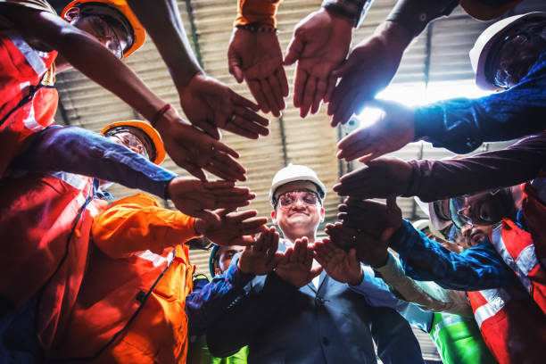 istock Unity among the blue collar employees and the owner 945926282