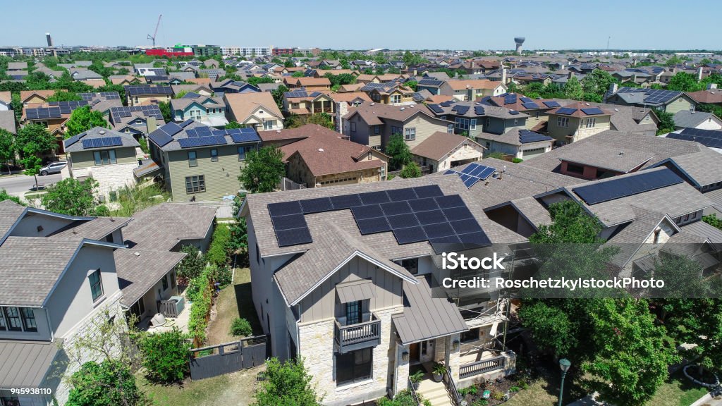 Mueller Suburb Solar Panel Rooftops and Modern Austin Living Aerial drone view of suburb neighborhood in East Austin community houses and homes - Mueller Suburb Solar Panel Rooftops and Modern Austin Living Solar Panel Stock Photo