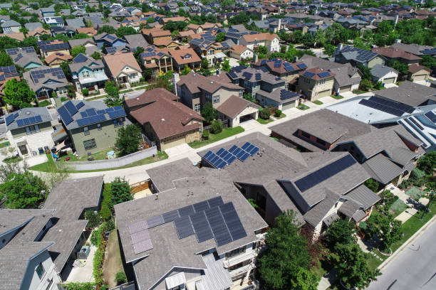 istock Climate Ready homes in Mueller Suburb Solar Panel Rooftops and Modern Austin Living 945938112
