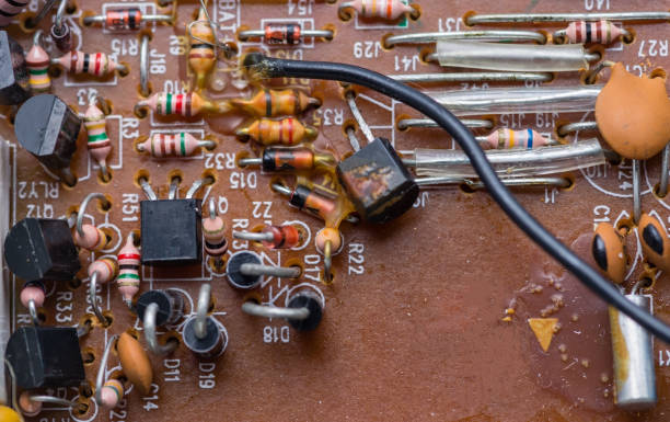 istock Wire in middle of circuit board 945939014