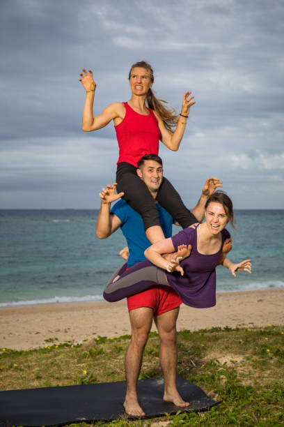 Funny Yoga Dragon Pose Stock Photo - Download Image Now - Acroyoga, Beach,  Humor - iStock