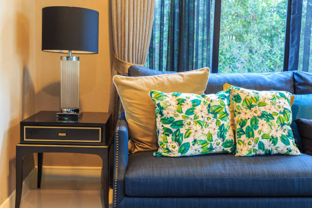 istock A blue sofa and lamp in living room. 945947878