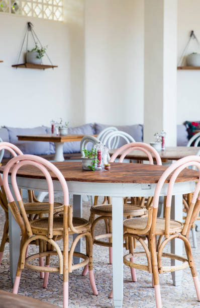 istock Table with chairs in the restaurant in loft slyle 945966134
