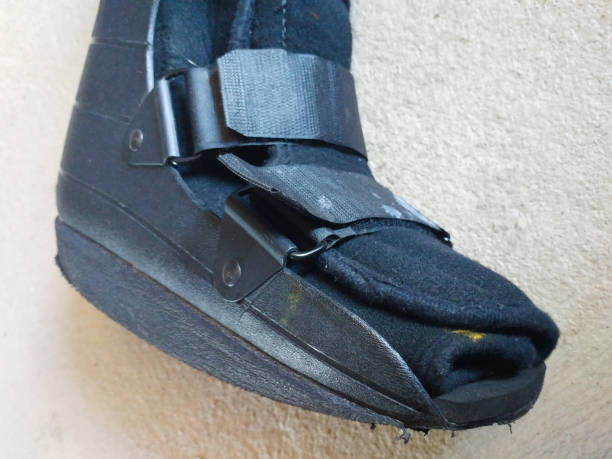 istock A black Orthopedic or medical boot, cast or footwear 945975416