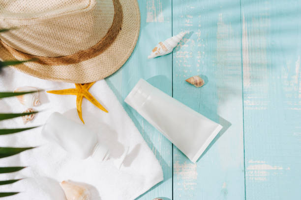 istock beach accessories on wooden board 945975878