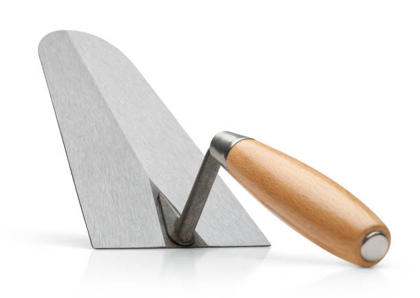 istock Trowel on white background. Photo with clipping path. 945978392