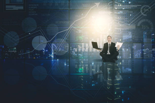 istock Peaceful businessman with growth graph background 945981040