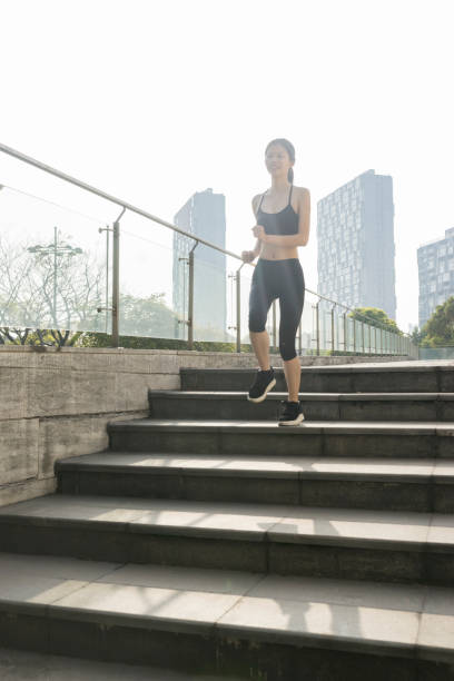 istock woman running in city 945992884