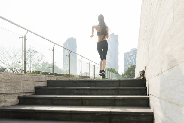istock woman running in city 945992904