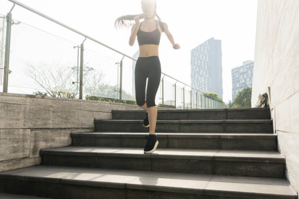 istock woman running in city 945992916