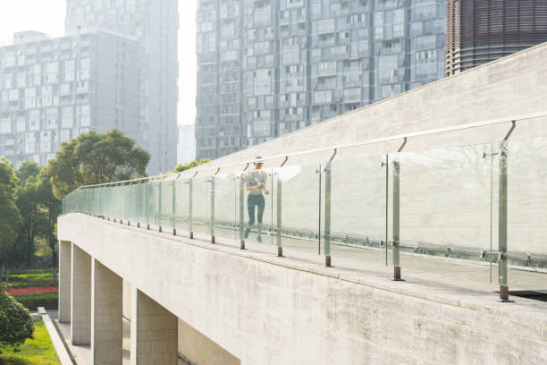 istock woman running in city 945995270