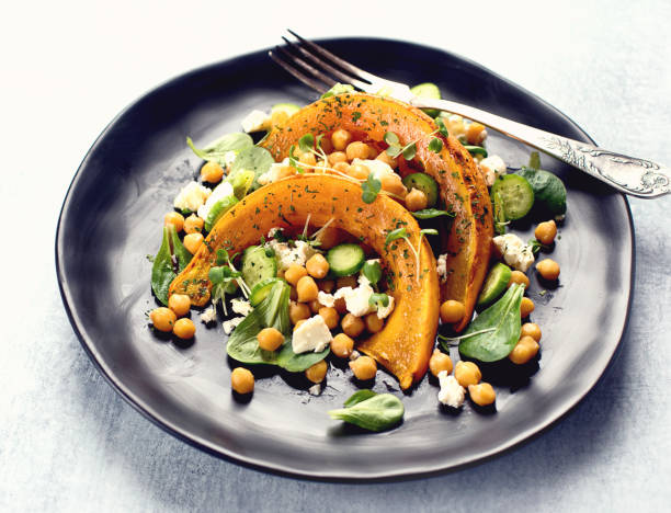 istock Roasted pumpkin salad with feta 945996422