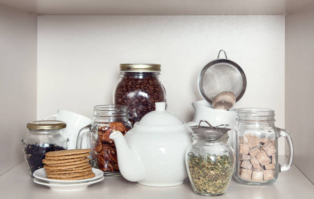 istock Sugar, tea , cookies and coffee beans for breakfast 945997302